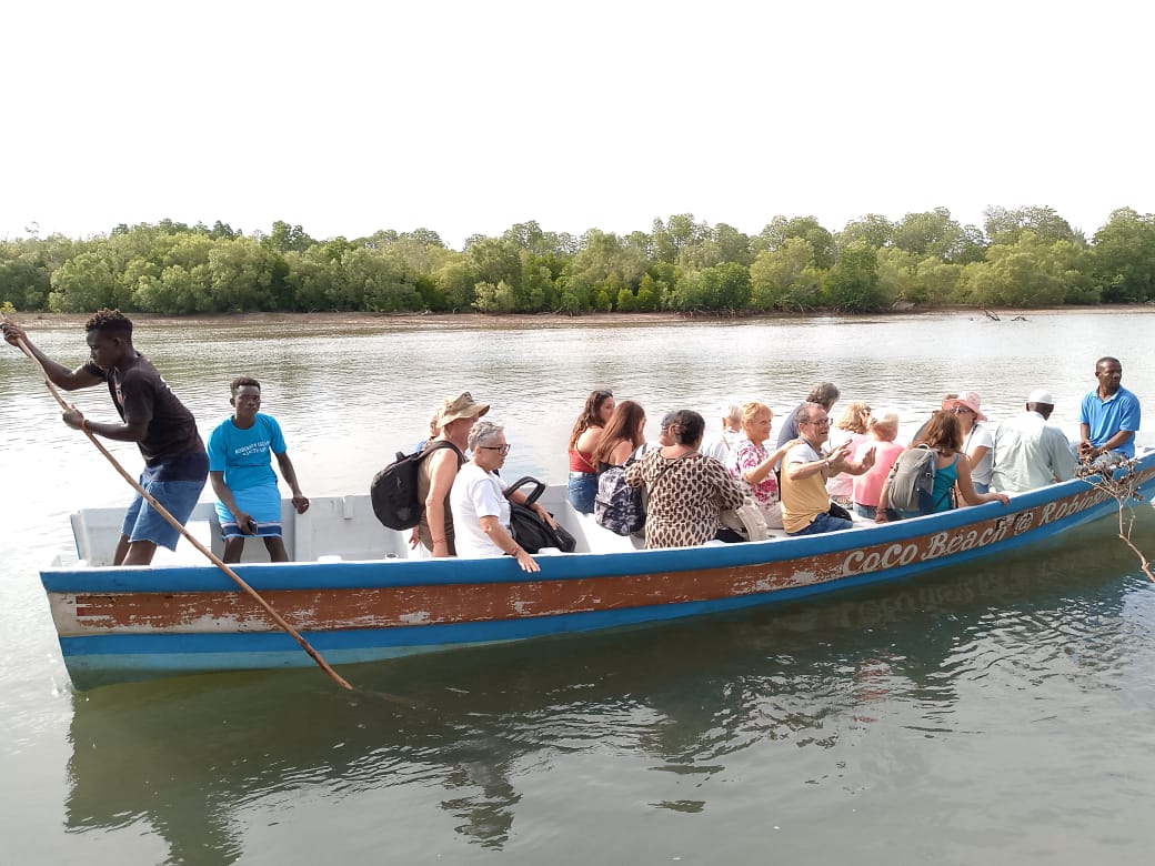 Gallo Tours safari guide with clients in Masai Mara
